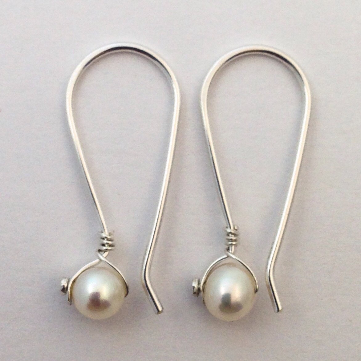 Pearl Silver Dangle Earrings by Maribelle Campa