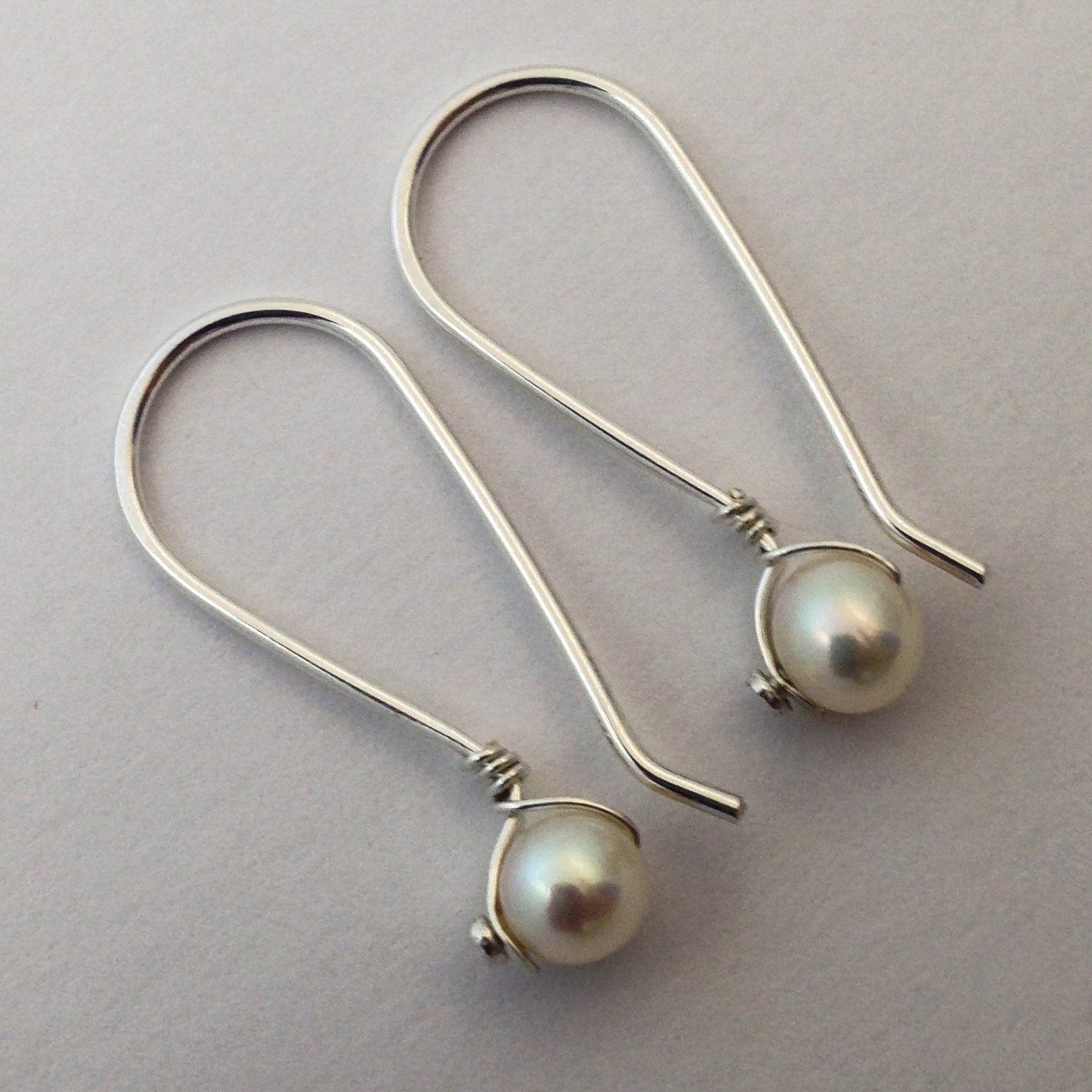 Pearl Silver Dangle Earrings by Maribelle Campa