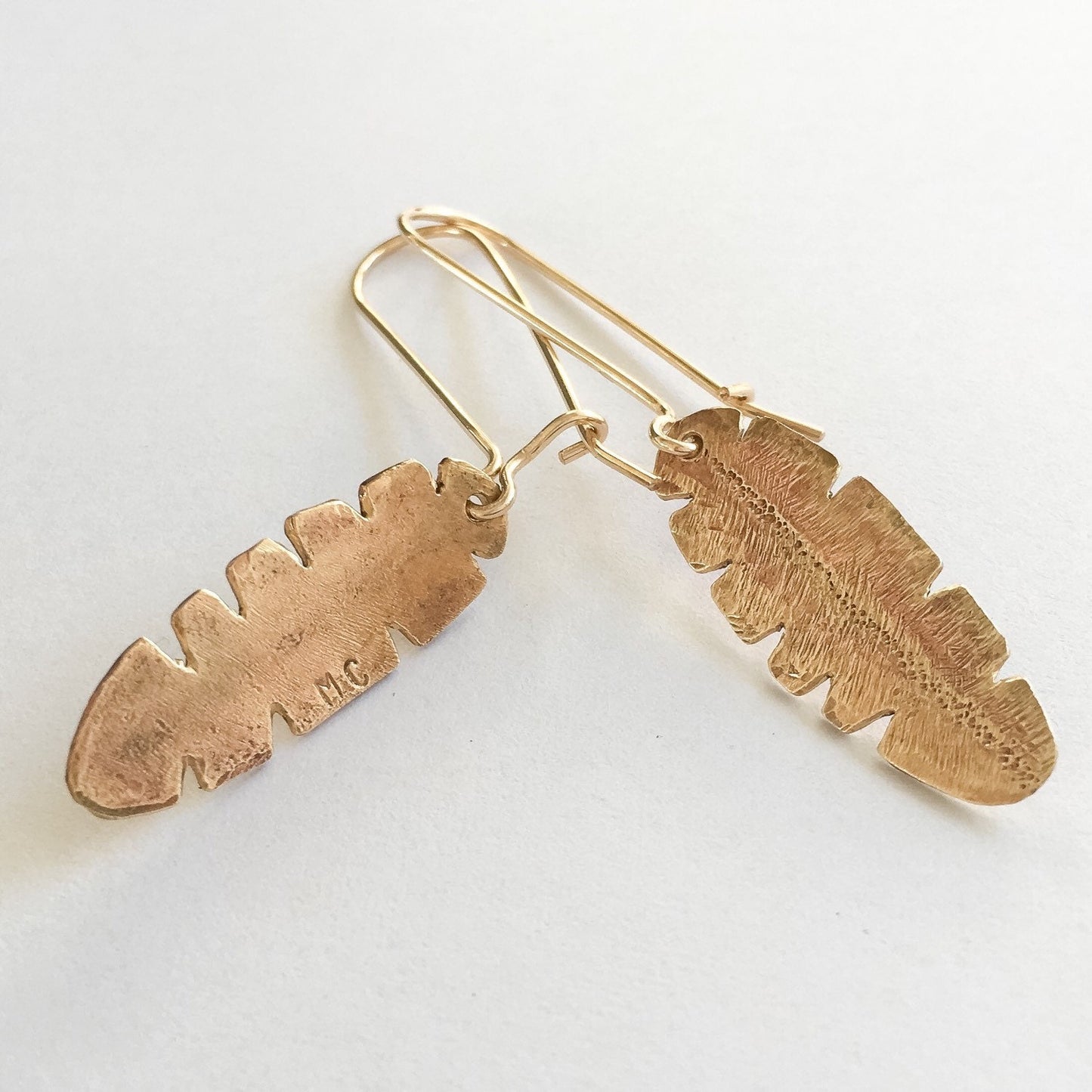 Gold and Brass Banana Leaf Earrings by Maribelle Campa