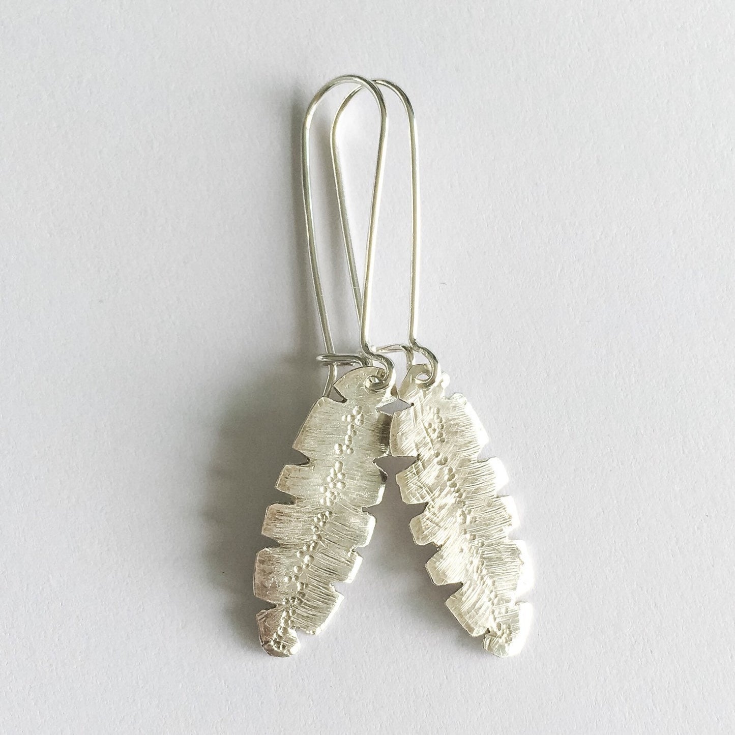 Silver Banana Leaf Artisan Earrings by Maribelle Campa