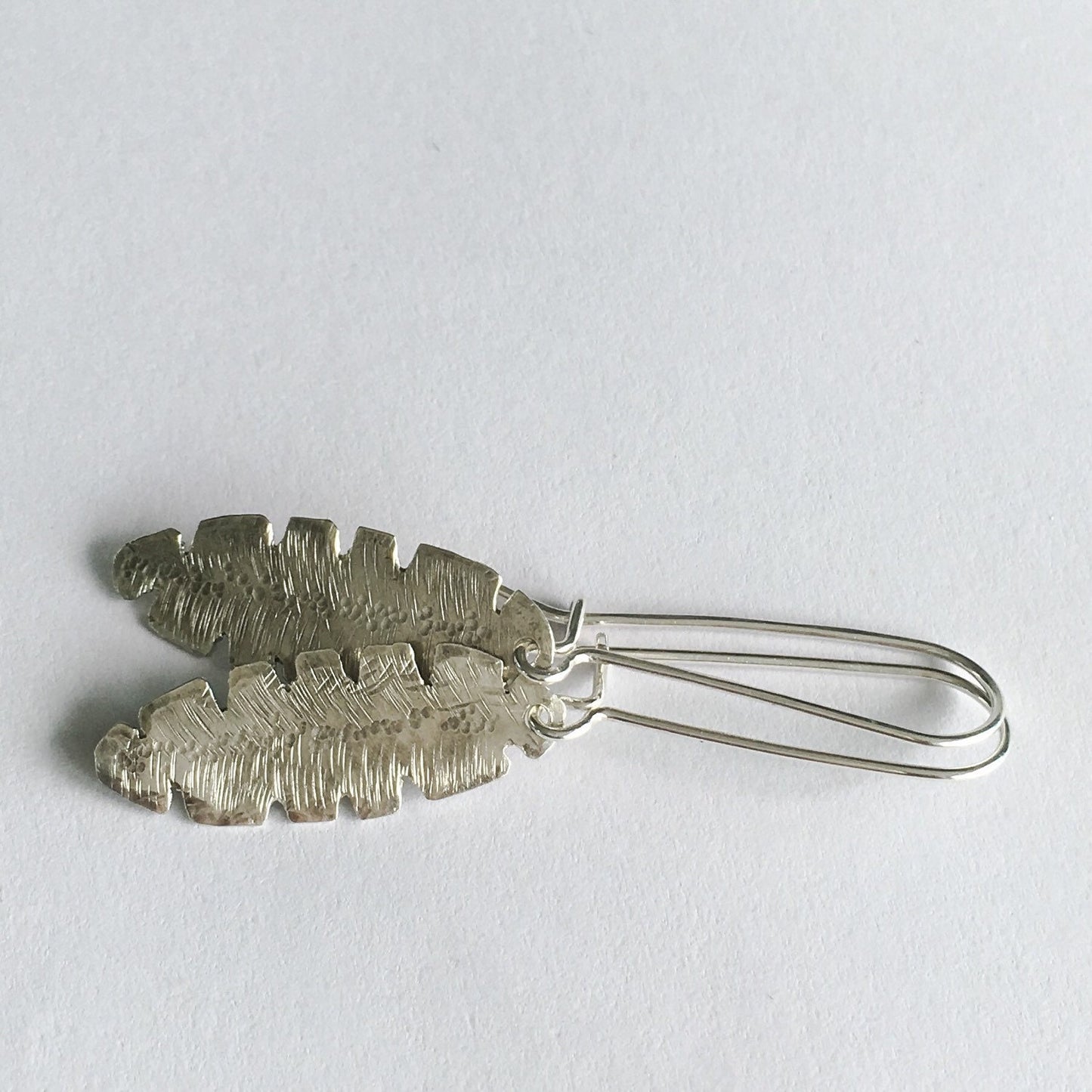 Silver Banana Leaf Artisan Earrings by Maribelle Campa