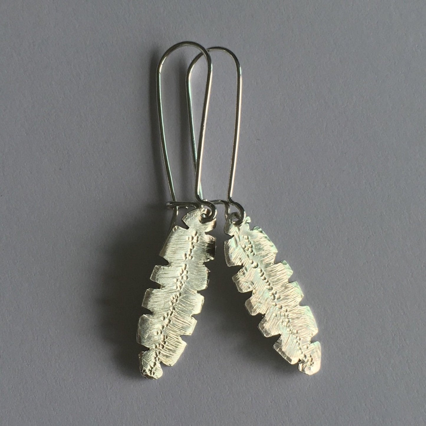 Silver Banana Leaf Artisan Earrings by Maribelle Campa