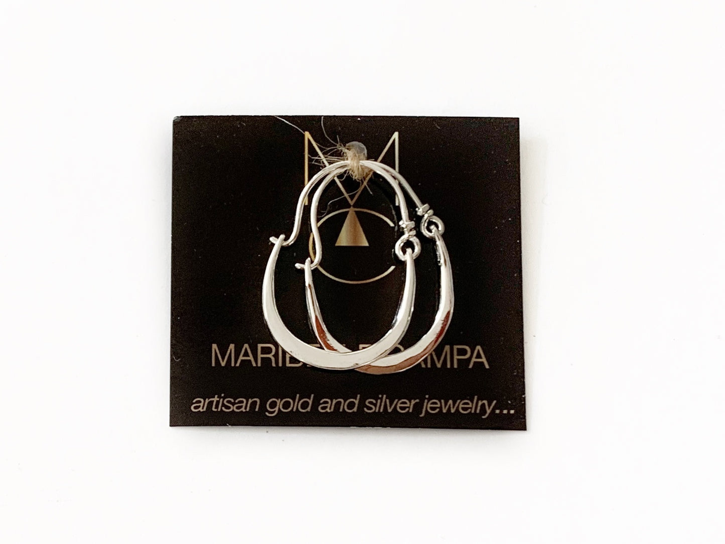 Hammered Silver Hoop Earrings by Maribelle Campa