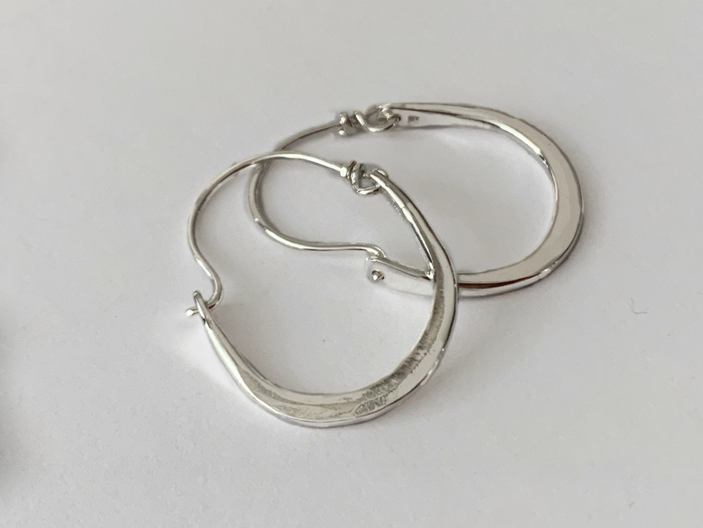 Hammered Silver Hoop Earrings by Maribelle Campa