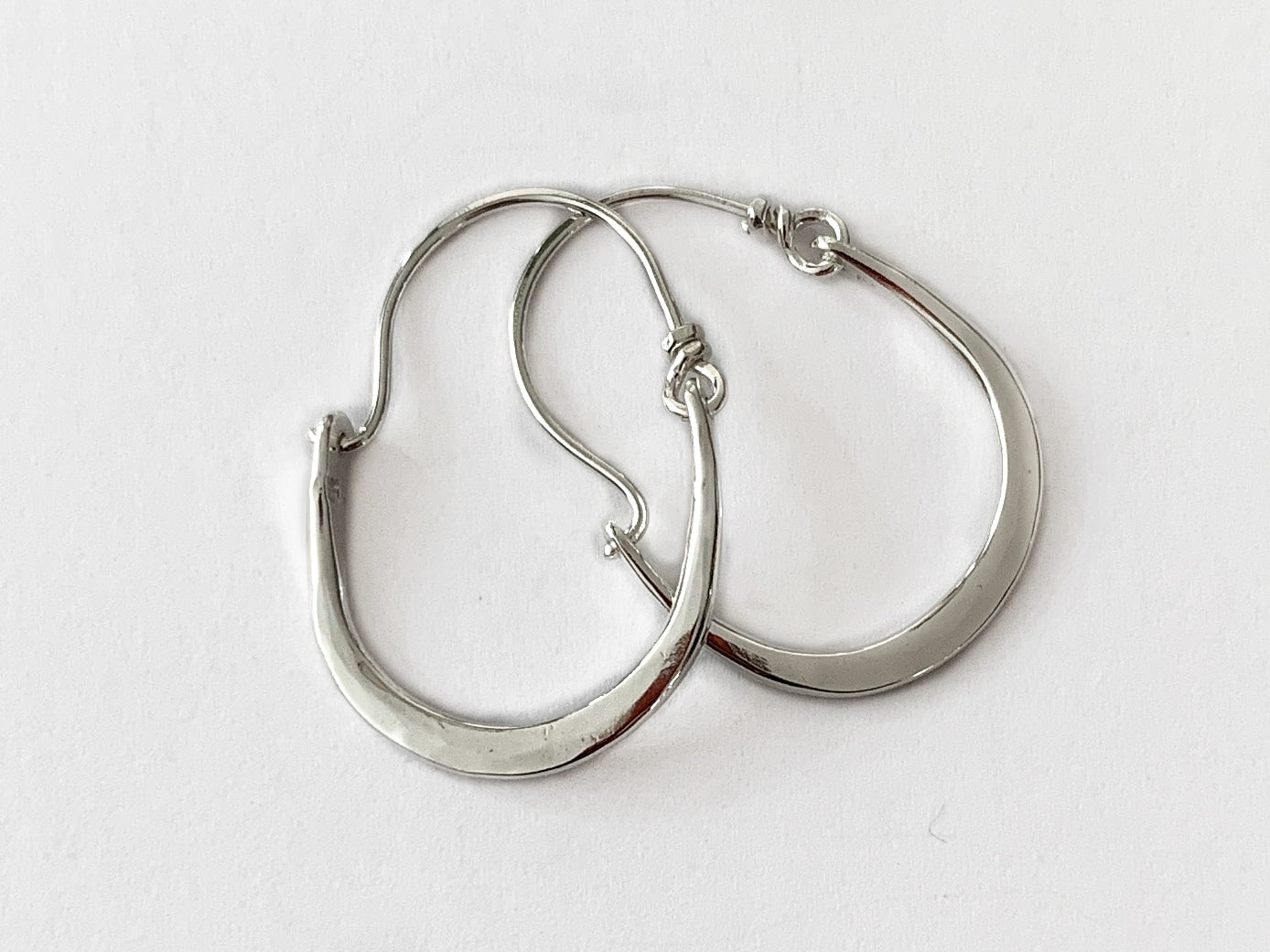 Hammered Silver Hoop Earrings by Maribelle Campa